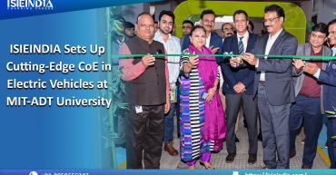 Inauguration ceremony of the Centre of Excellence in Electric Vehicles and Emerging Technologies at MIT-ADT University, Pune, established by ISIEINDIA. Dignitaries from government, Tata Motors, NCVET, and MIT-ADT management present on stage, highlighting collaboration for skill development and innovation in EV, AI, and IoT.