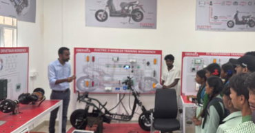Students engaged in hands-on Electric Vehicle training at Jharkhand University COE Lab